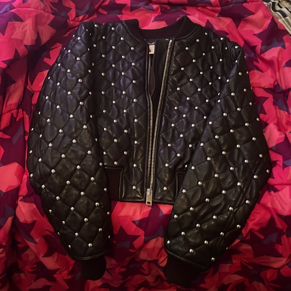 Medium Michael Kors leather jacket. Cuffed arms and cotton bottom